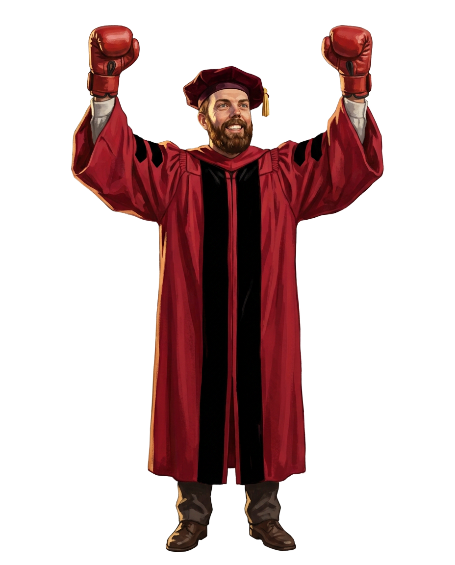 Kevin in doctoral cap and gown, arms raised